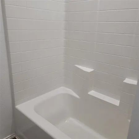 a close up of a bathtub