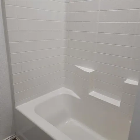 a close up of a bathtub