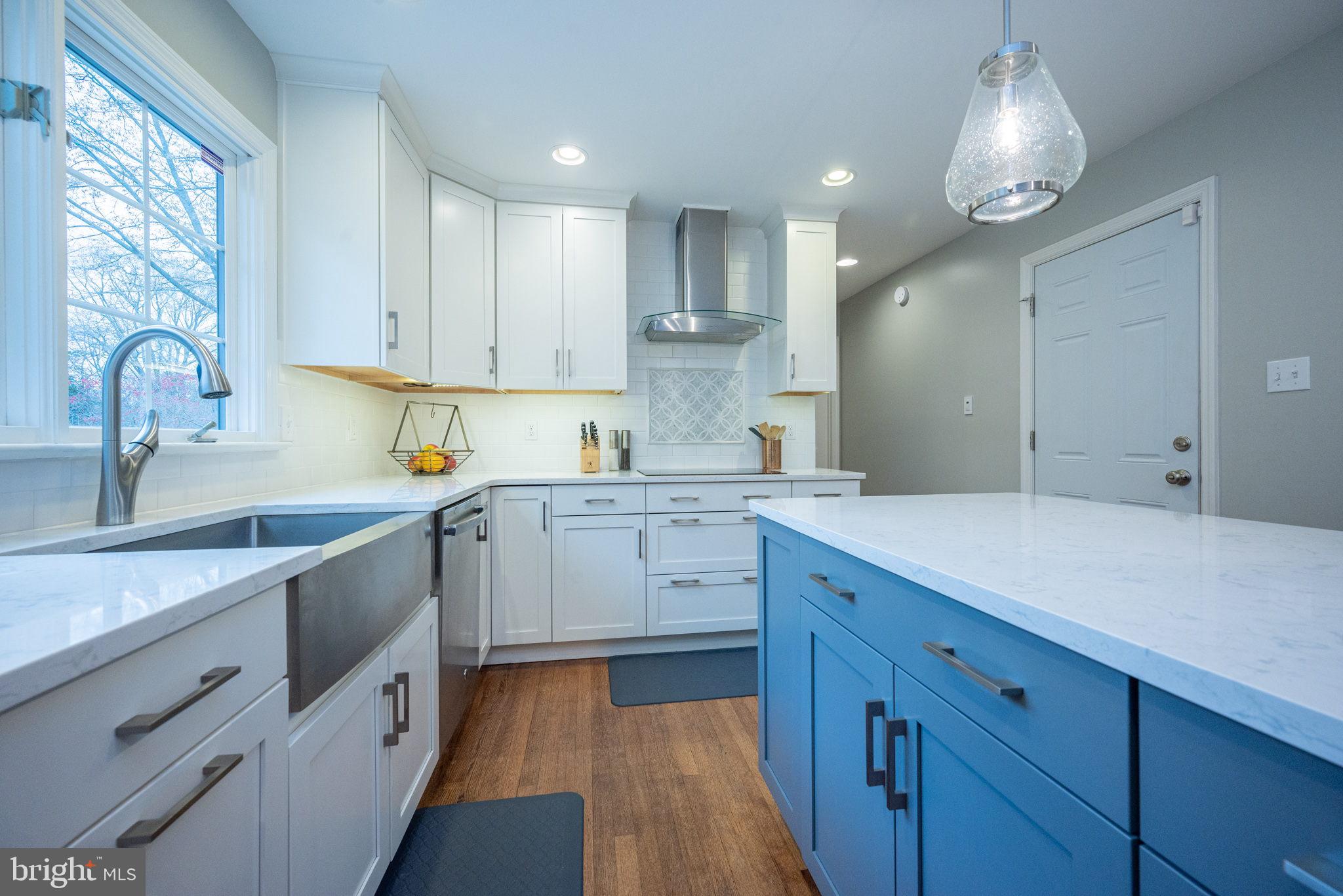 34 Raphael Road Hockessin, DE 19707 - Photo 14 of 60 a kitchen with cabinets appliances and a sink