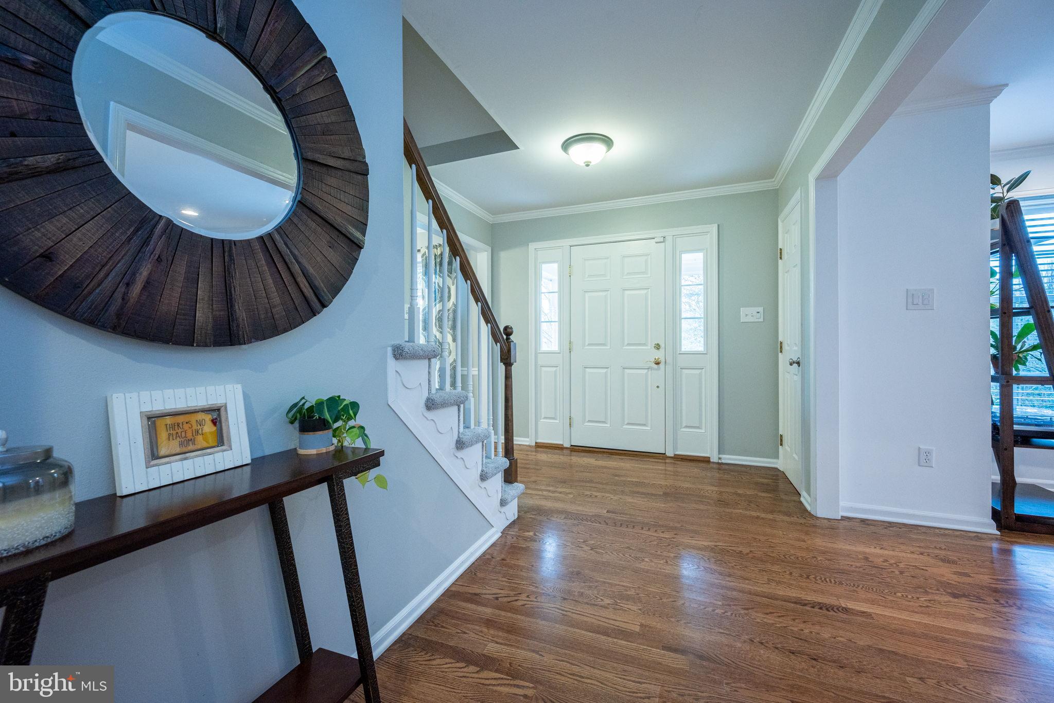 34 Raphael Road Hockessin, DE 19707 - Photo 3 of 60 a view of an entryway with wooden floor