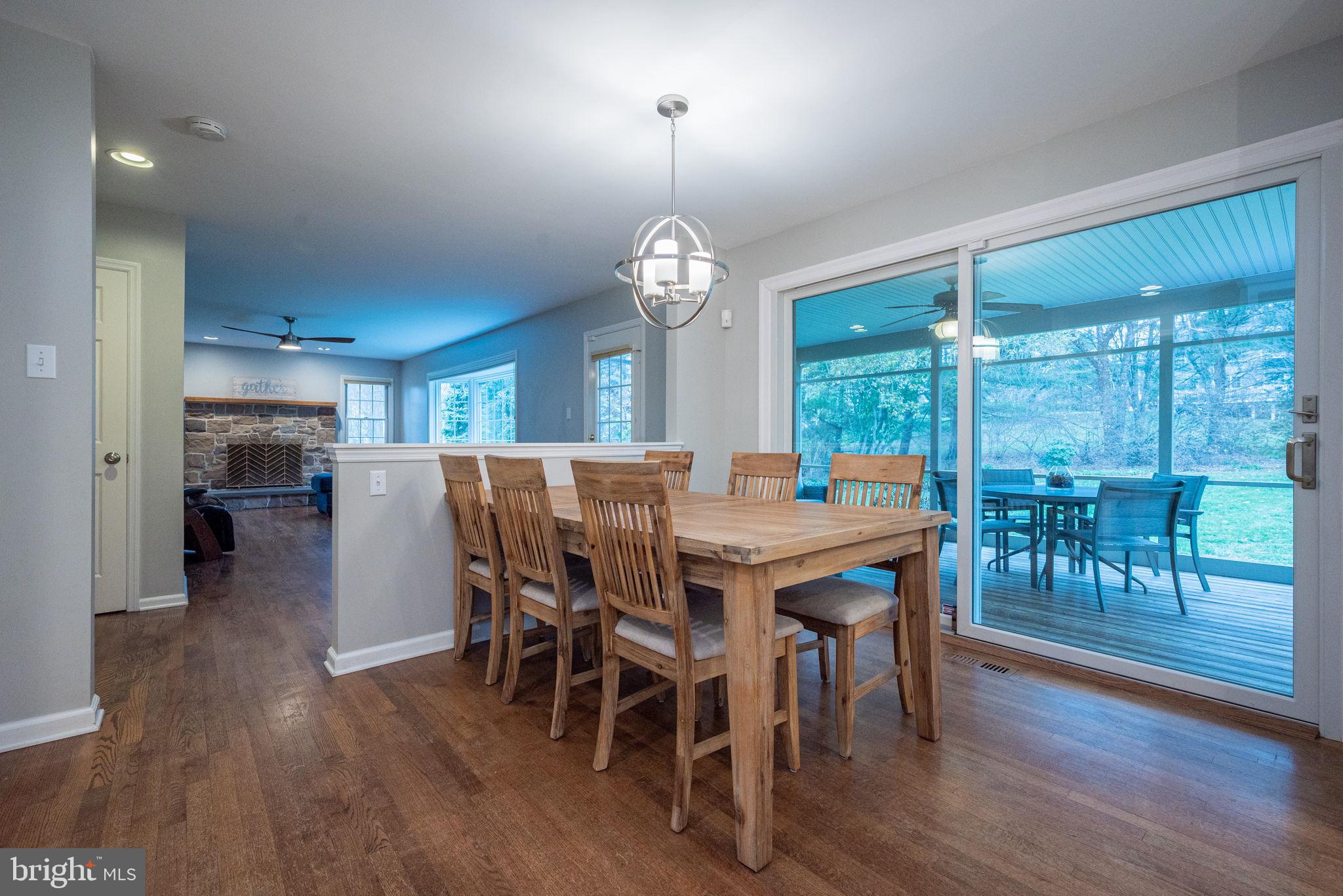 34 Raphael Road Hockessin, DE 19707 - Photo 22 of 60 a view of a dining room with furniture window and wooden floor