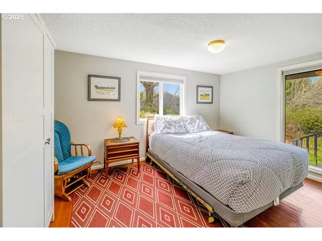 a view of a bedroom from a hallway