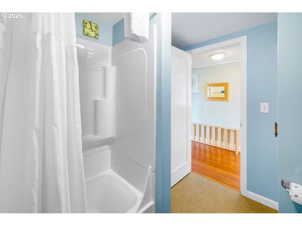 25990 Sandlake Road Cloverdale, OR 97112 - Photo 20 of 40 a view of an entryway with wooden floor