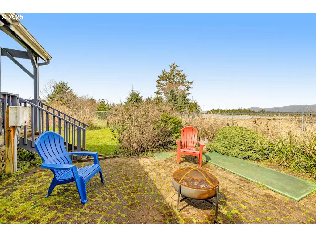 25990 Sandlake Road Cloverdale, OR 97112 - Photo 28 of 40 a view of a swimming pool with lounge chair