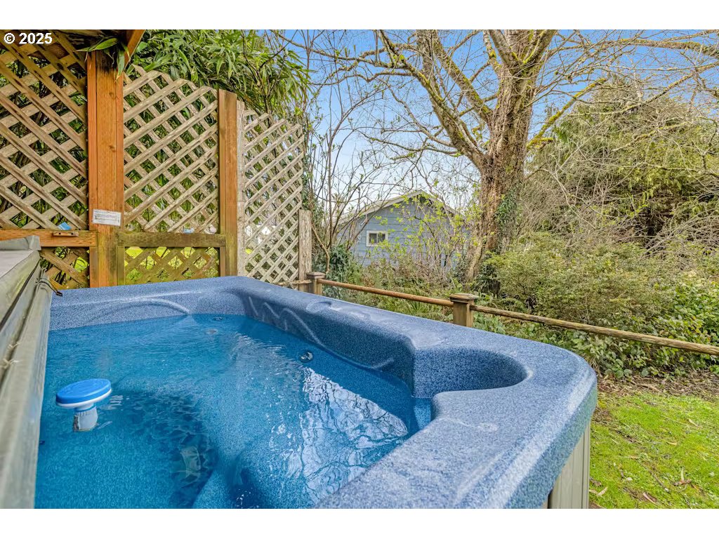 25990 Sandlake Road Cloverdale, OR 97112 - Photo 29 of 40 a bathroom with a sink and vanity