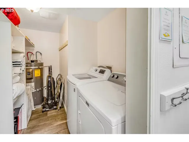a wooden bench sitting in front of a building