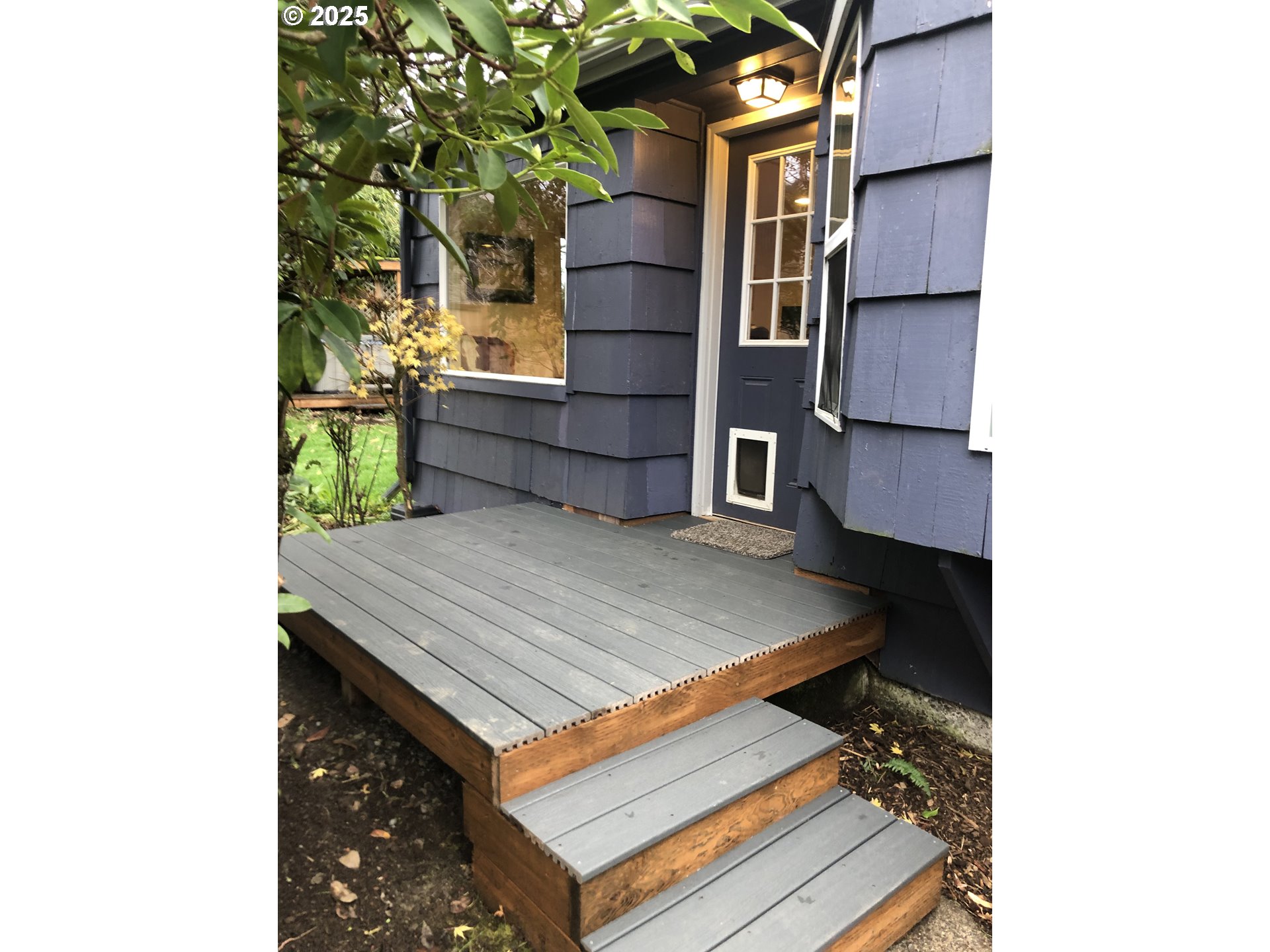 25990 Sandlake Road Cloverdale, OR 97112 - Photo 32 of 40 a wooden bench sitting in front of a building