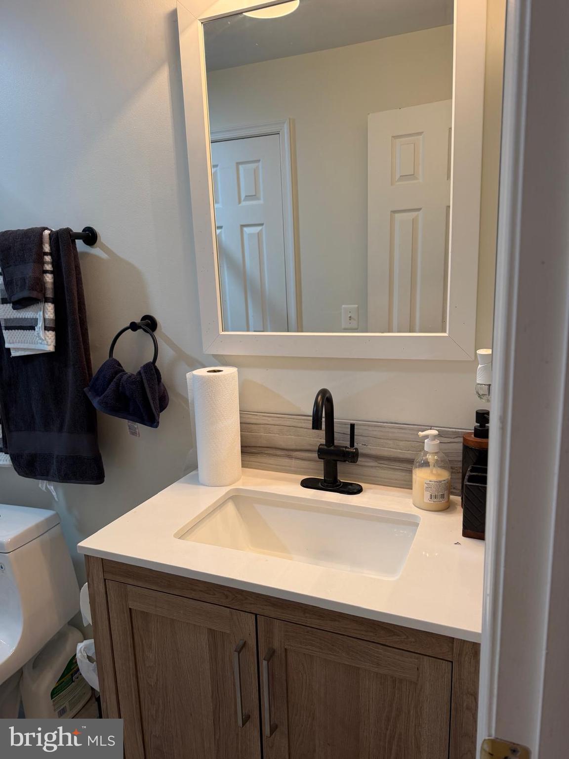 18970 Rosings Way Triangle, VA 22172 - Photo 7 of 16 a bathroom with a sink and a toilet