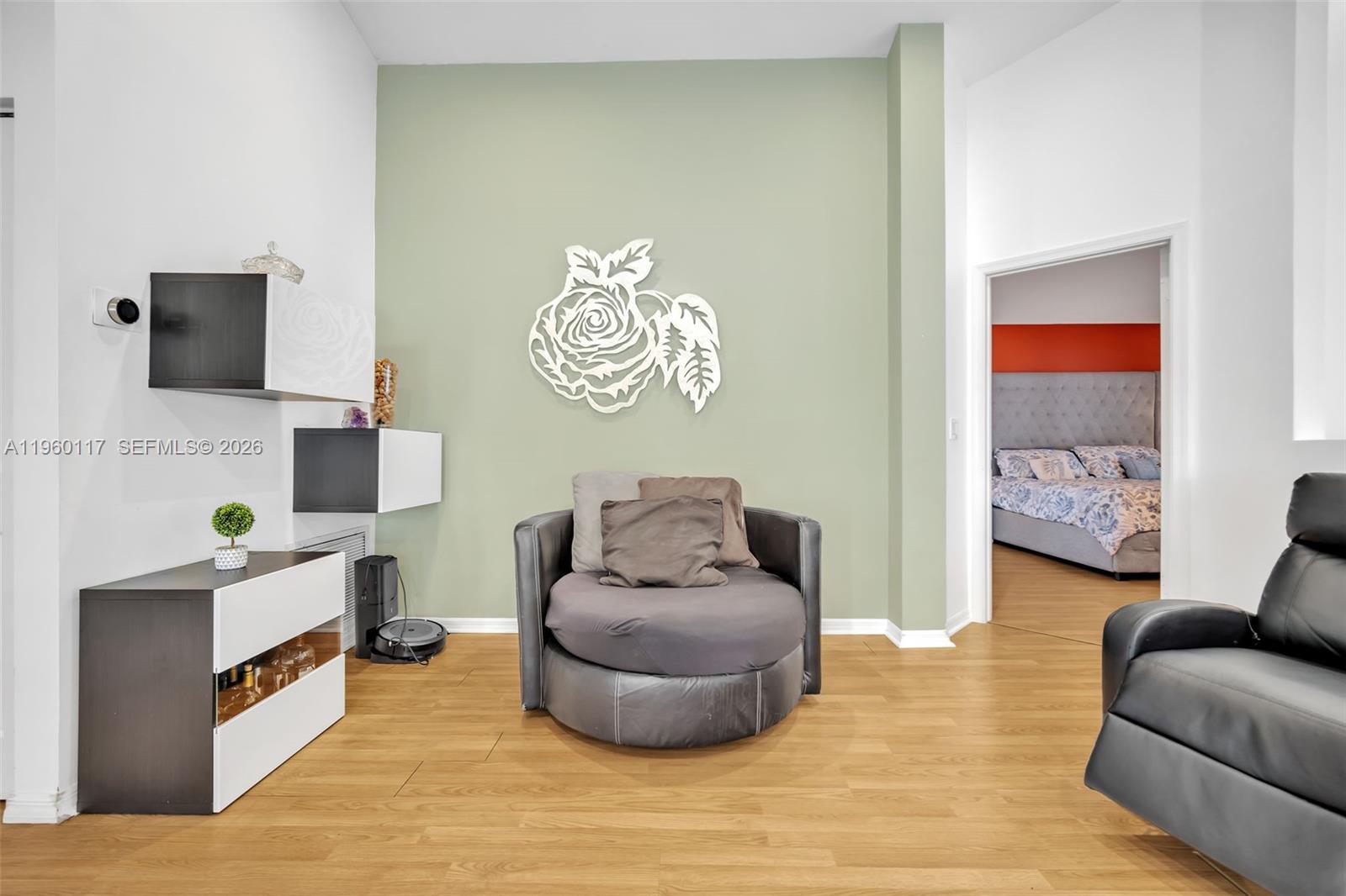 10337 Coventry Court Boca Raton, FL 33428 - Photo 14 of 44 a living room with furniture and a flat screen tv