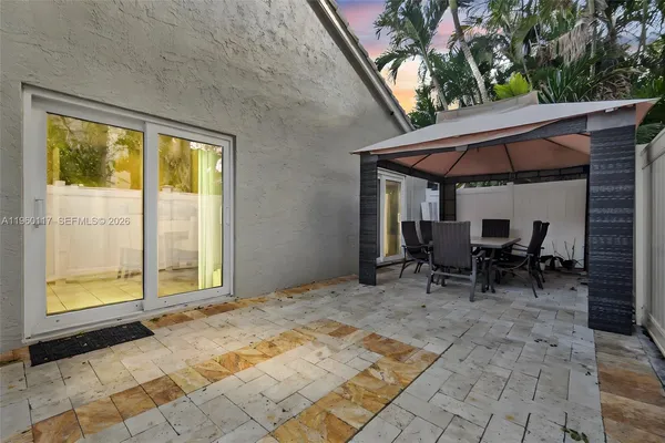 a view of outdoor space with seating area