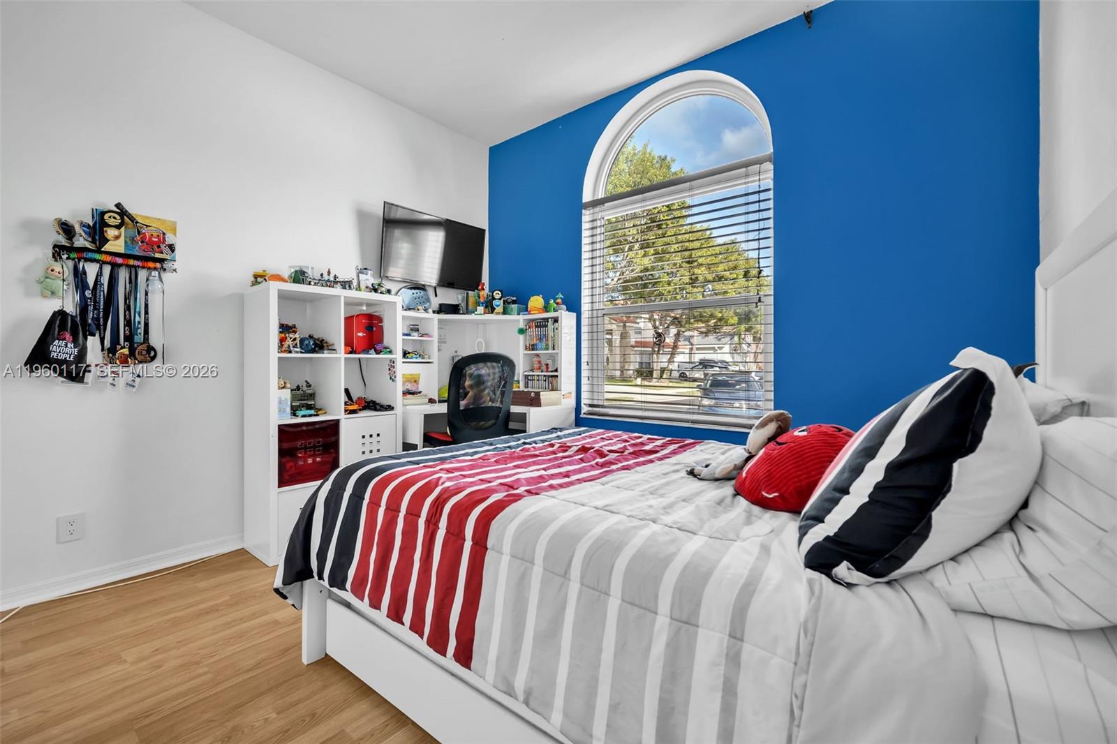 10337 Coventry Court Boca Raton, FL 33428 - Photo 27 of 44 a bedroom with a bed and a fireplace