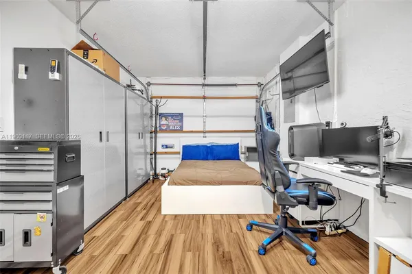 a bed room with a bed and a window