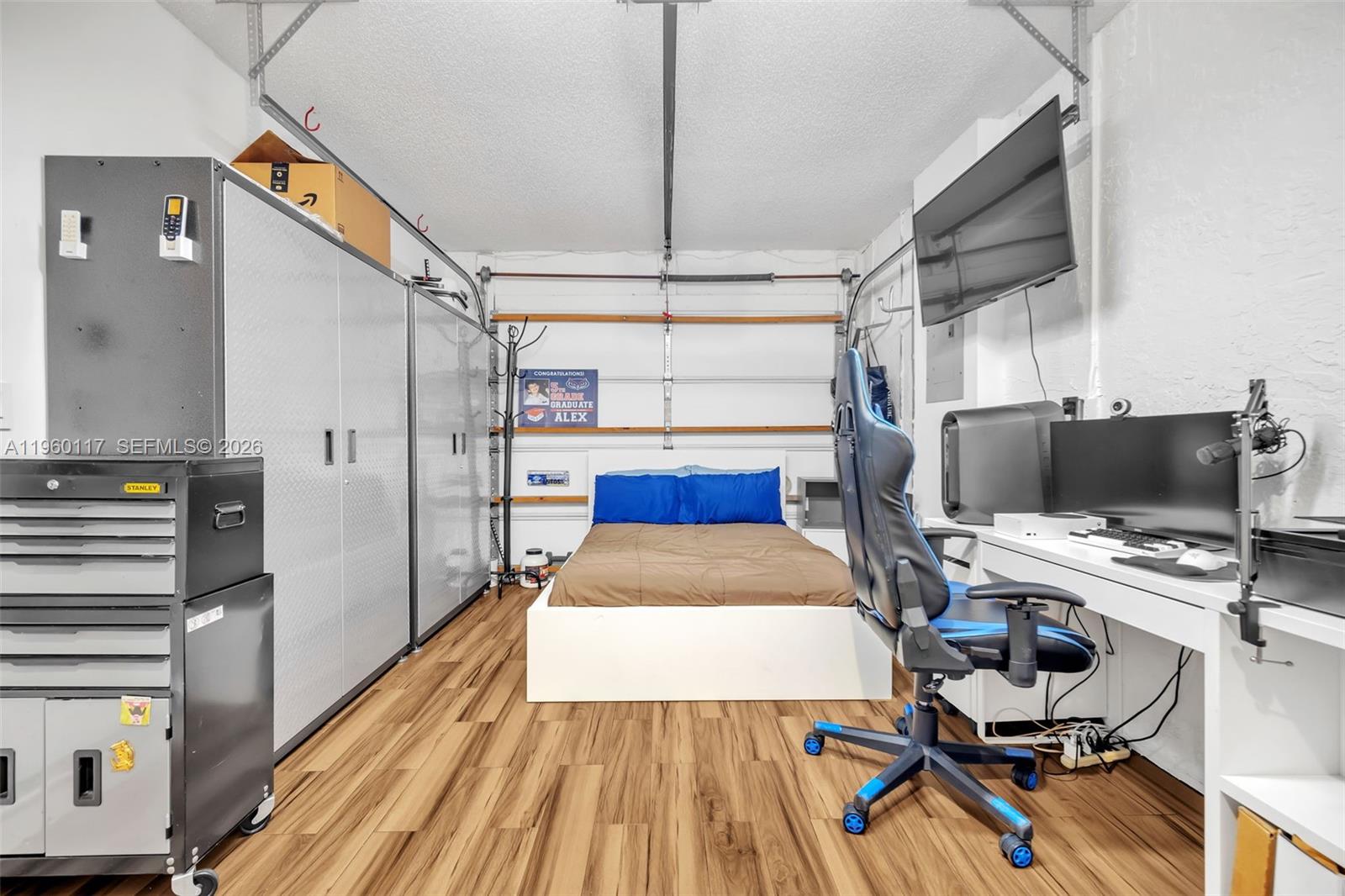 10337 Coventry Court Boca Raton, FL 33428 - Photo 30 of 44 a bed room with a bed and a window