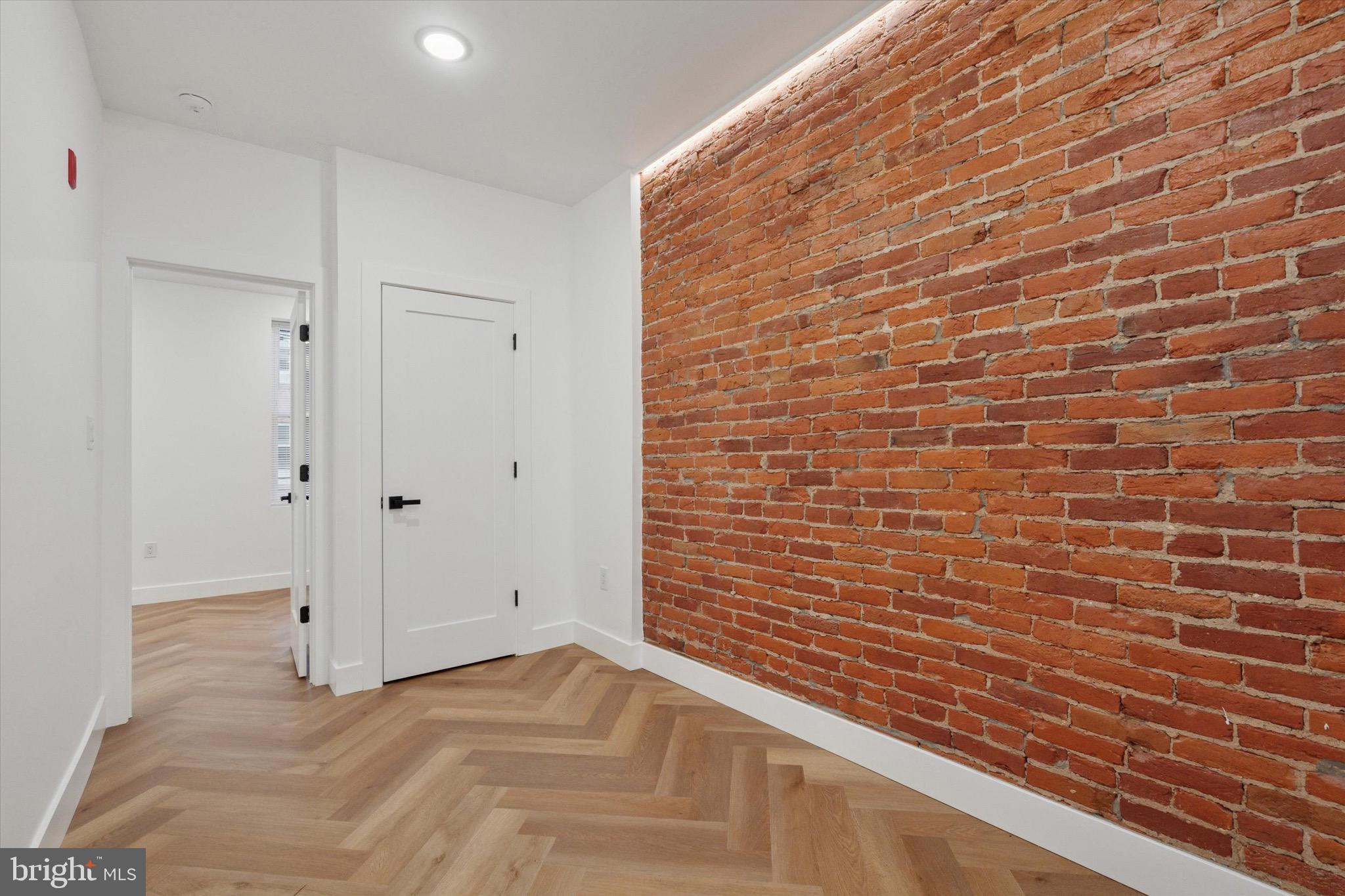 1438 Tasker Street, Unit 2 Philadelphia, PA 19145 - Photo 5 of 11 a view of wooden door