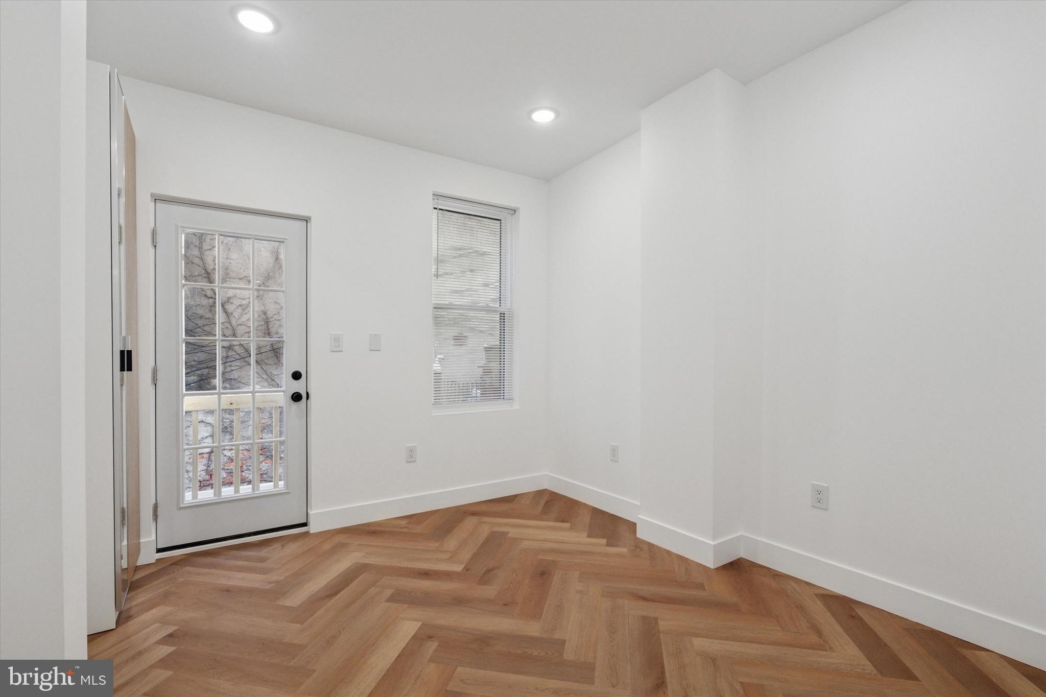 1438 Tasker Street, Unit 2 Philadelphia, PA 19145 - Photo 9 of 11 a view of room with window