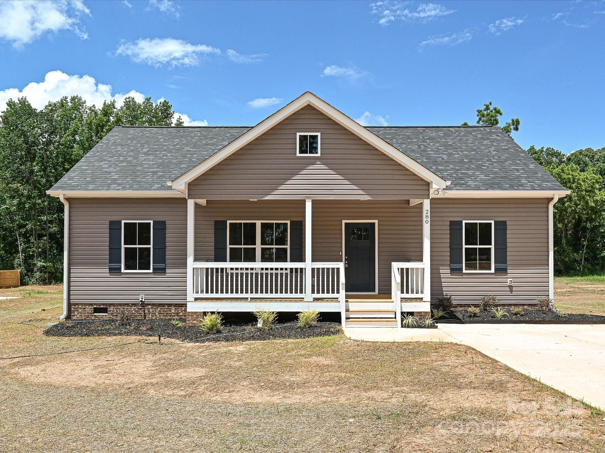 280 Old Pinckney Road York, SC 29745 - Photo 1 of 29 a front view of a house with a yard