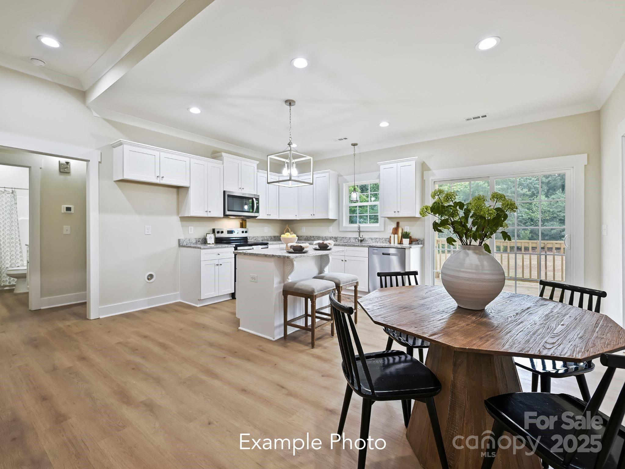 280 Old Pinckney Road York, SC 29745 - Photo 8 of 29 a kitchen with a table and chairs in it