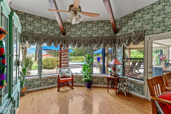 a view of a swimming pool with a patio