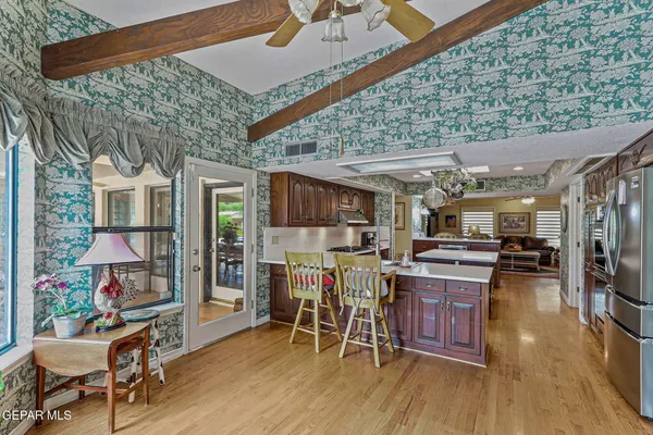 a view of a swimming pool with a patio