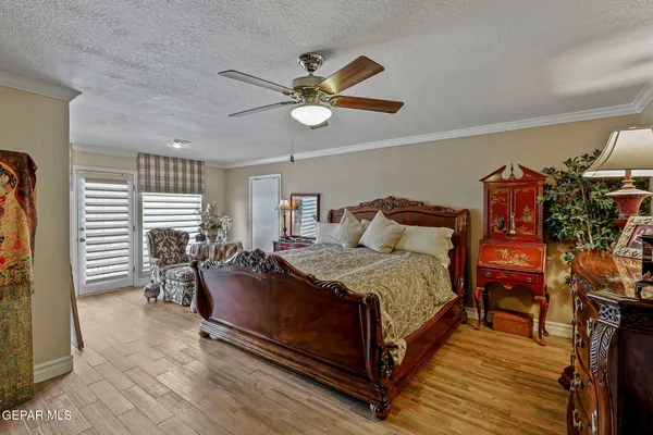 a bathroom with a sink a mirror and a shower