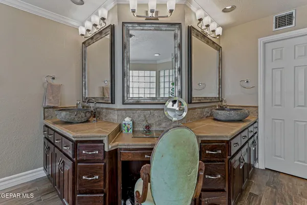 a view of green field with tree in the background