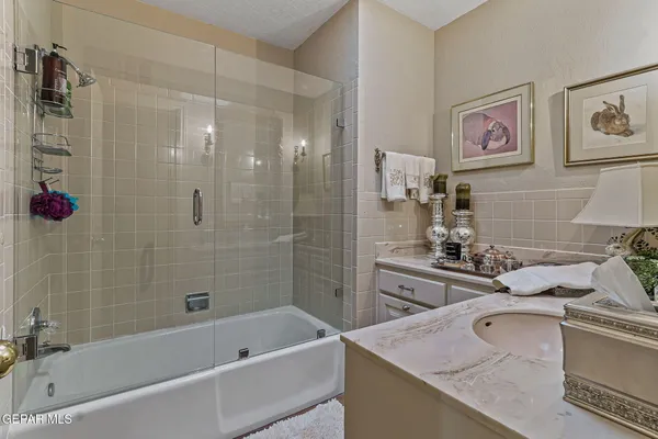 a aerial view of a house with pool lake view and mountain view