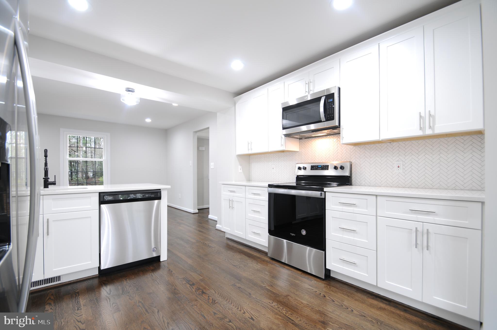 12023 Canter Lane Reston, VA 20191 - Photo 17 of 48 Quartz Counters w/ Backsplash