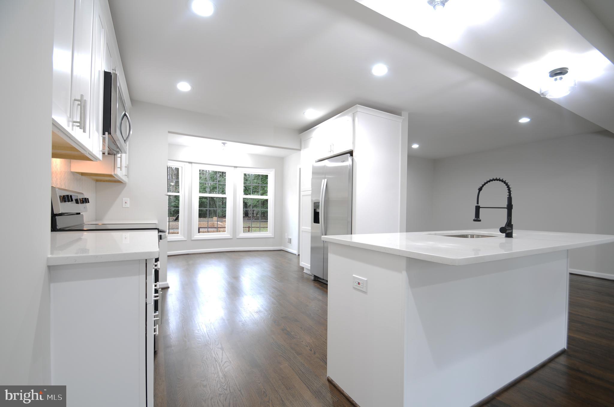12023 Canter Lane Reston, VA 20191 - Photo 18 of 48 Gourmet Kitchen w/ Island
