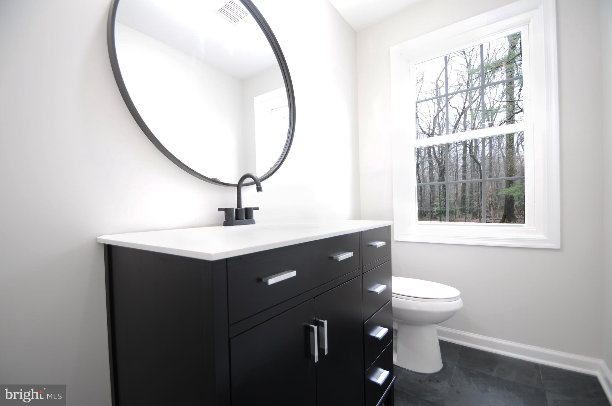 12023 Canter Lane Reston, VA 20191 - Photo 29 of 48 Main Level Half Bath