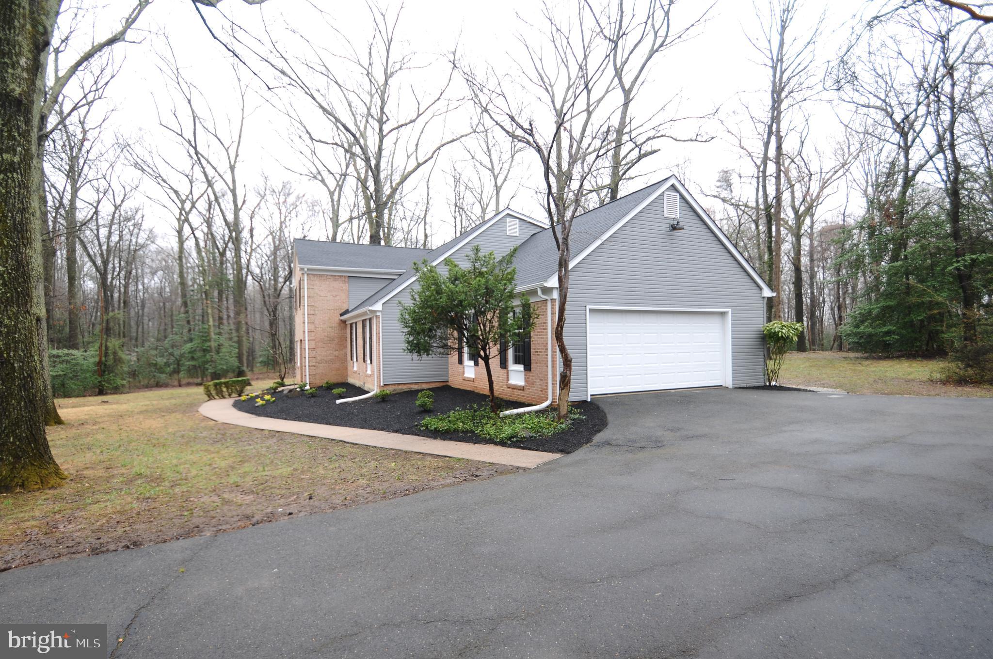 12023 Canter Lane Reston, VA 20191 - Photo 4 of 48 Side Load 2 Car Garage