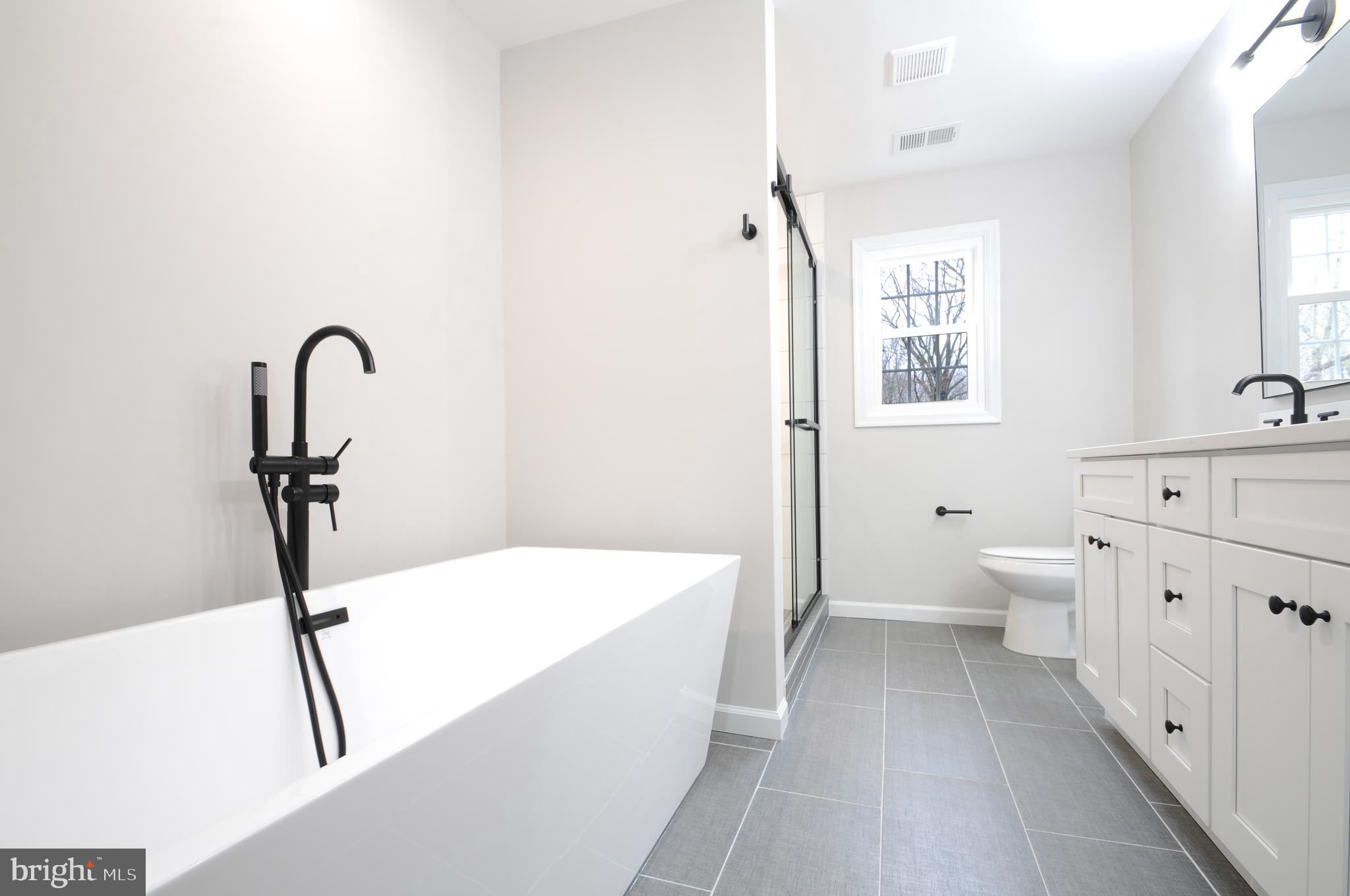 12023 Canter Lane Reston, VA 20191 - Photo 32 of 48 Master Bathroom w/ Sep. Tub & Shower