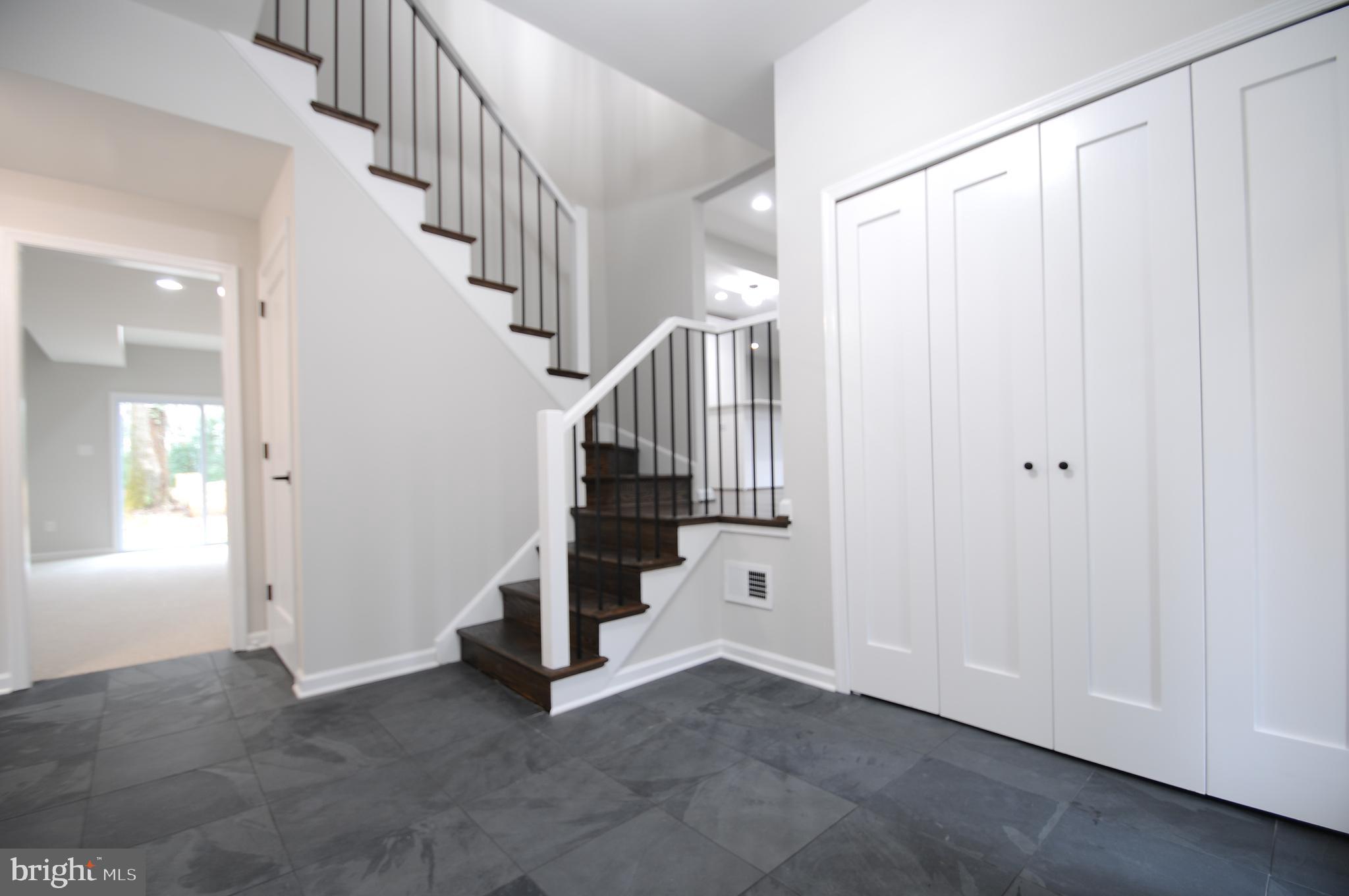 12023 Canter Lane Reston, VA 20191 - Photo 8 of 48 View from Foyer to Rear Family Room & UL