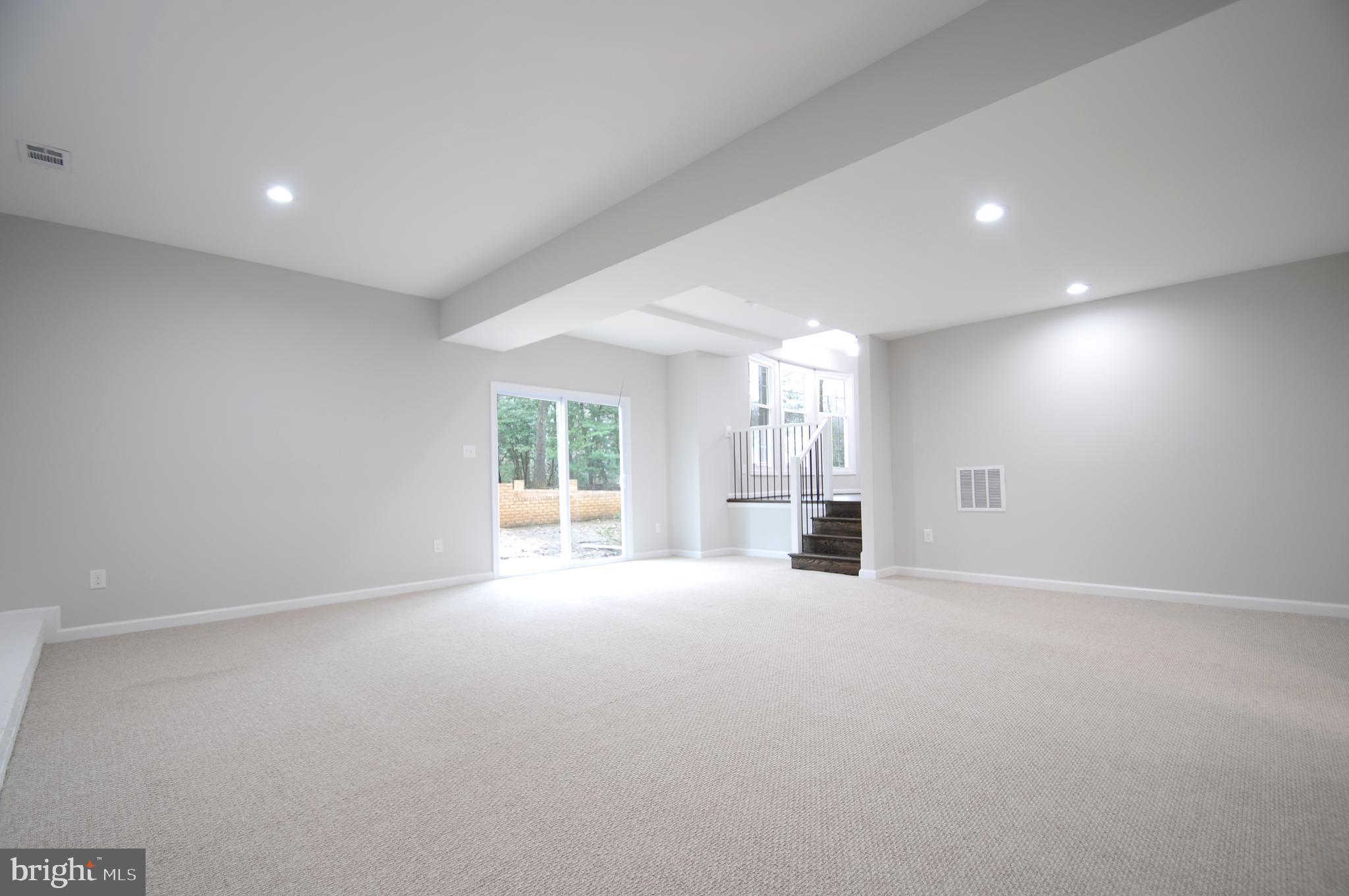 12023 Canter Lane Reston, VA 20191 - Photo 10 of 48 Family Room to outdoor Patio and Breakfast Room