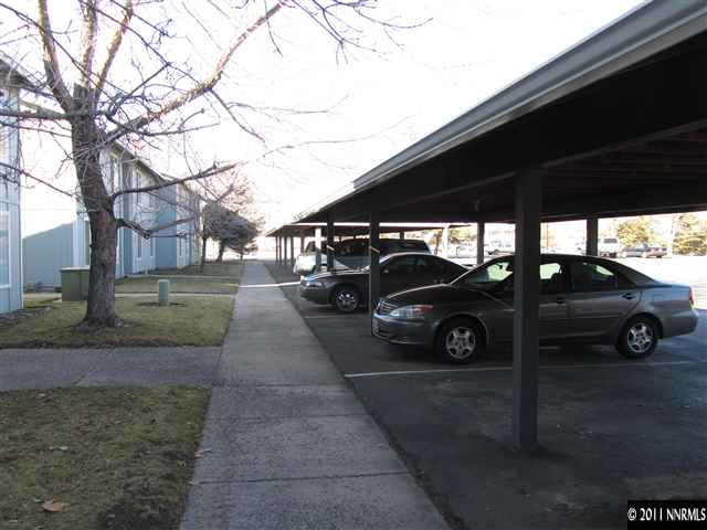400 South Saliman Road, Unit M101 Carson City, NV 89701 - Photo 5 of 6 a view of parking garage with cars parked