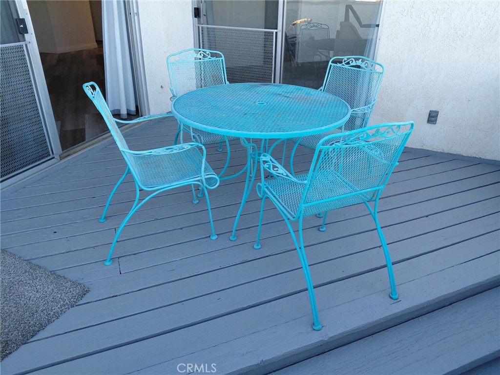 14530 Nautical Lane, Unit 15 Helendale, CA 92342 - Photo 12 of 14 a view of a room with wooden furniture