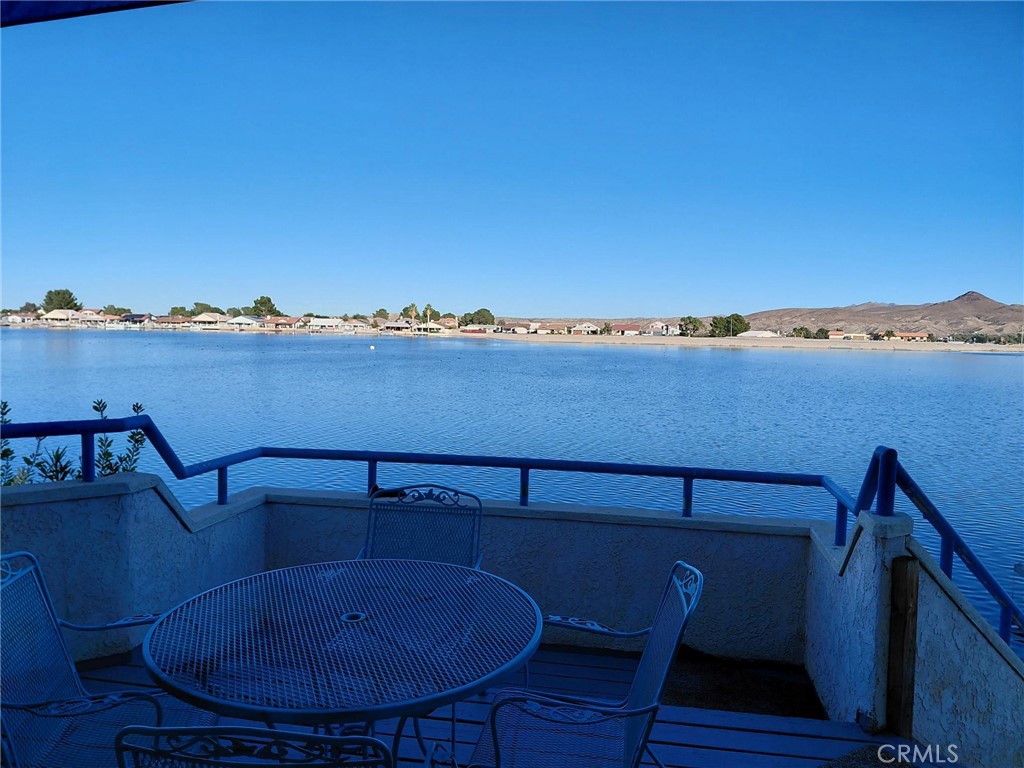 14530 Nautical Lane, Unit 15 Helendale, CA 92342 - Photo 14 of 14 a view of a chairs in a balcony