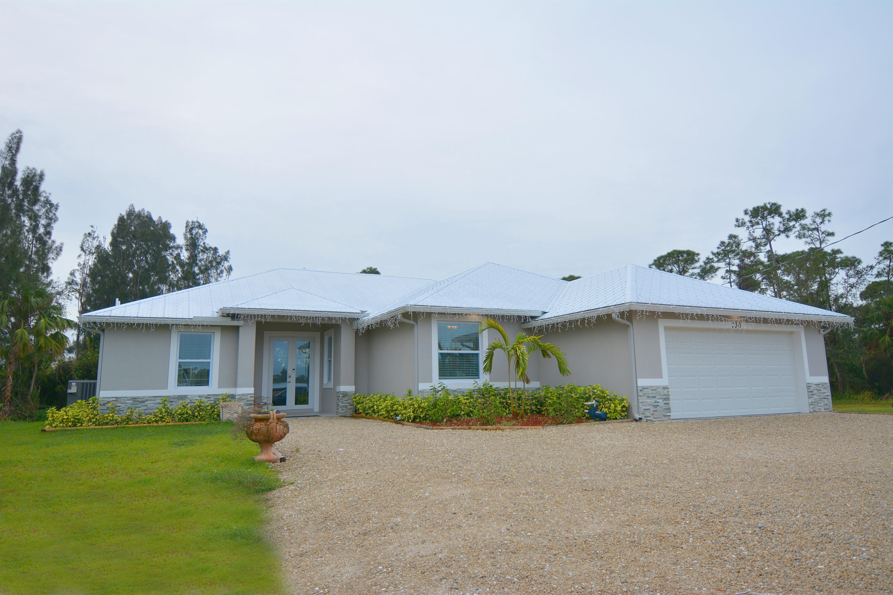 730 Southeast Salerno Road Stuart, FL 34997 - Photo 1 of 29 Front