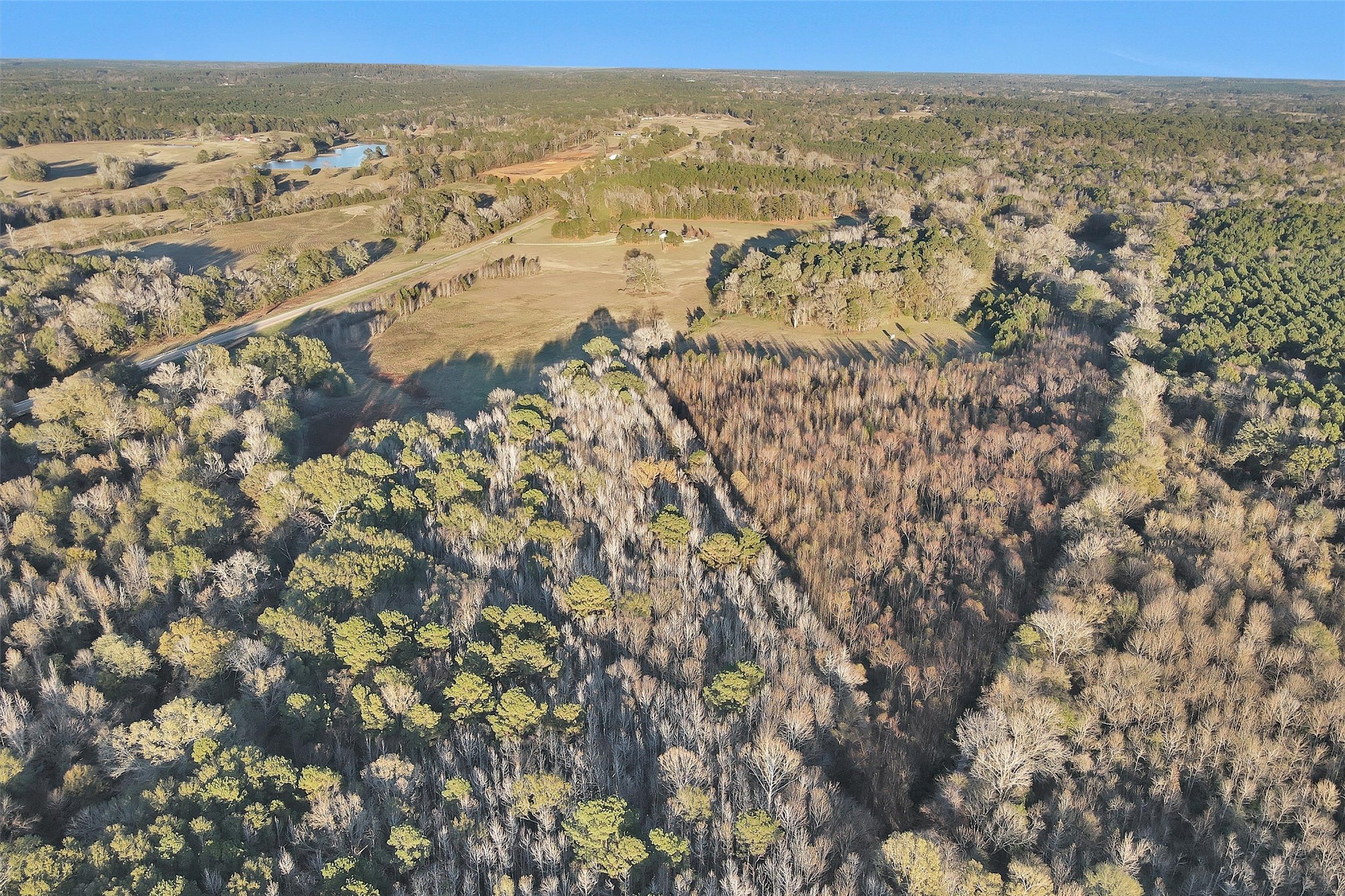 84 W Mount Mount Enterprise, TX 75681 - Photo 5 of 8 an aerial view of residential houses with outdoor space