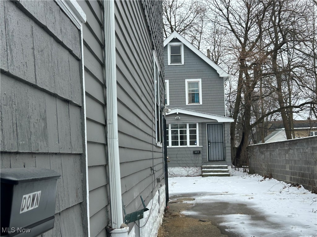 15218 Ridpath Avenue Cleveland, OH 44110 - Photo 2 of 11 View of snowy exterior