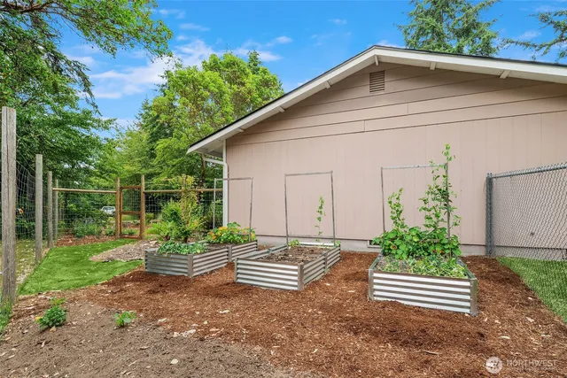 a house view with a garden space
