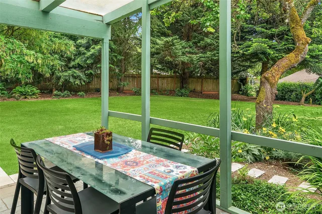 a view of an outdoor space with furniture