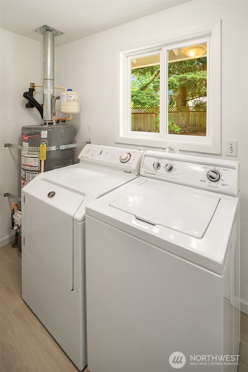 18304 McLean Road Southwest Vashon, WA 98070 - Photo 29 of 36 a utility room with dryer and washer