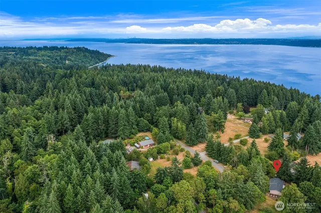 a view of an ocean and a yard