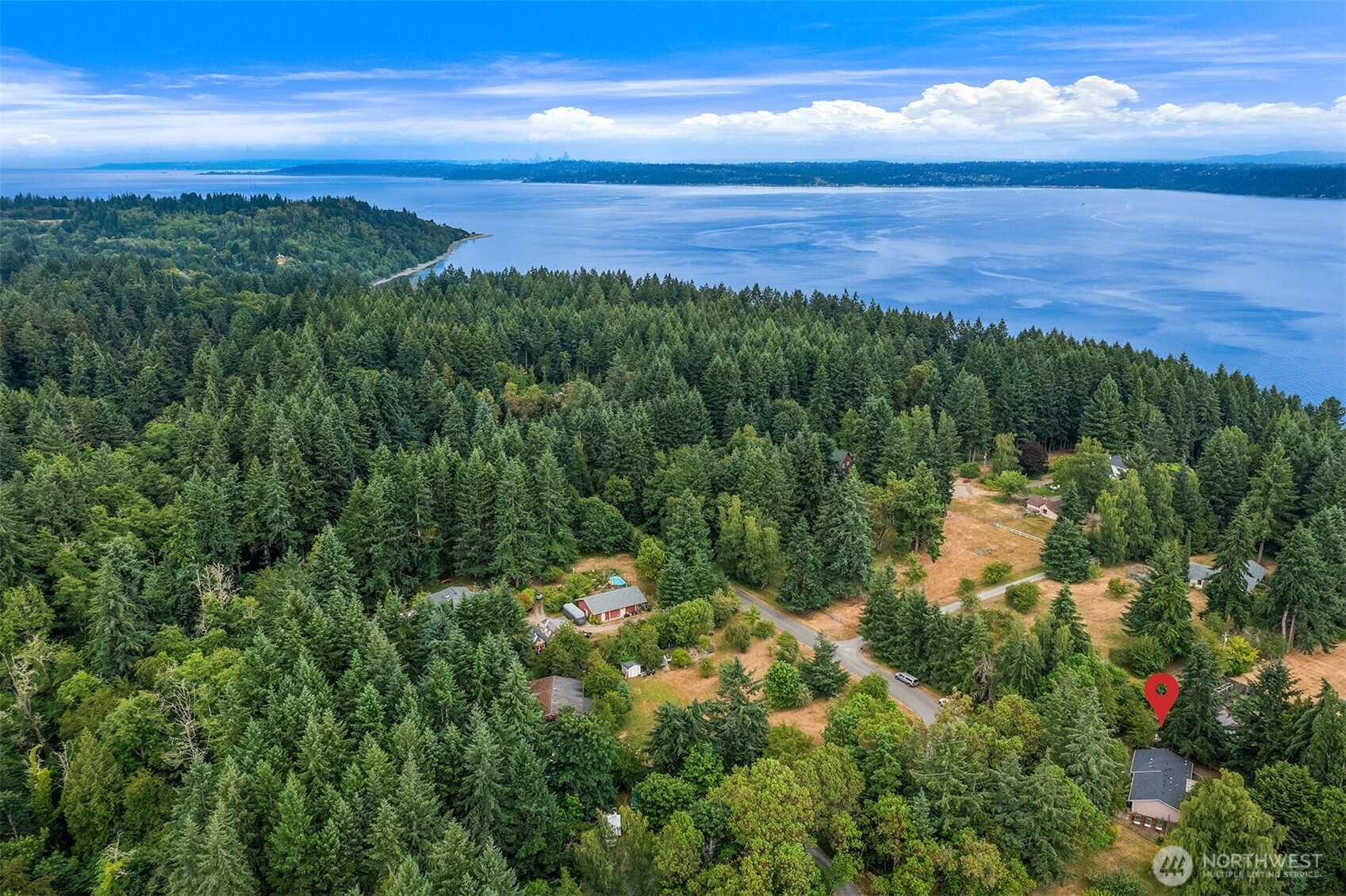 18304 McLean Road Southwest Vashon, WA 98070 - Photo 36 of 36 a view of an ocean and a yard