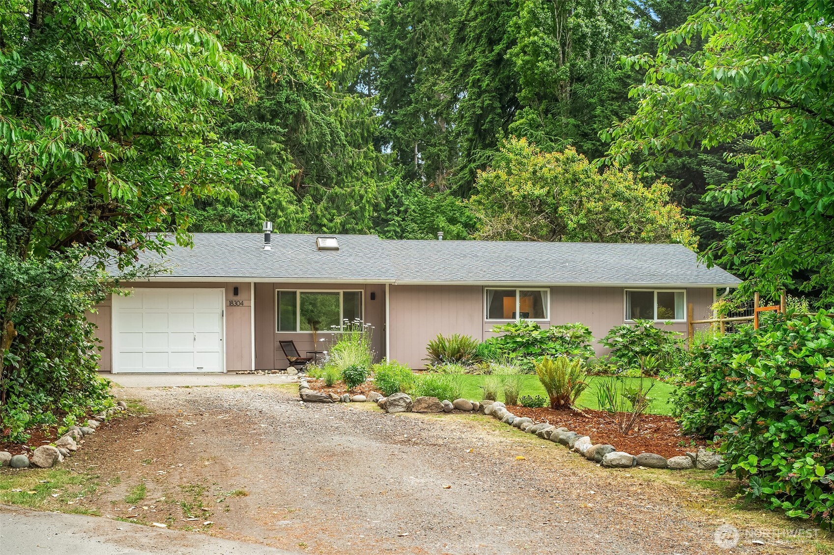 18304 McLean Road Southwest Vashon, WA 98070 - Photo 6 of 36 front view of a house with a yard