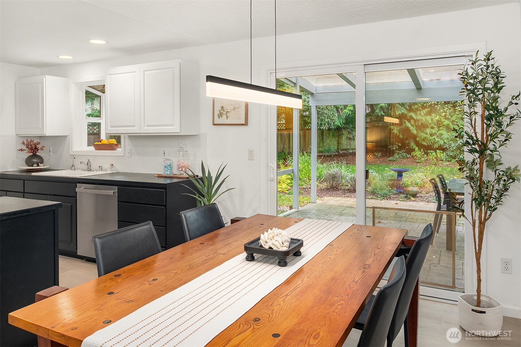18304 McLean Road Southwest Vashon, WA 98070 - Photo 10 of 36 a view of a dining room with furniture window and outside view
