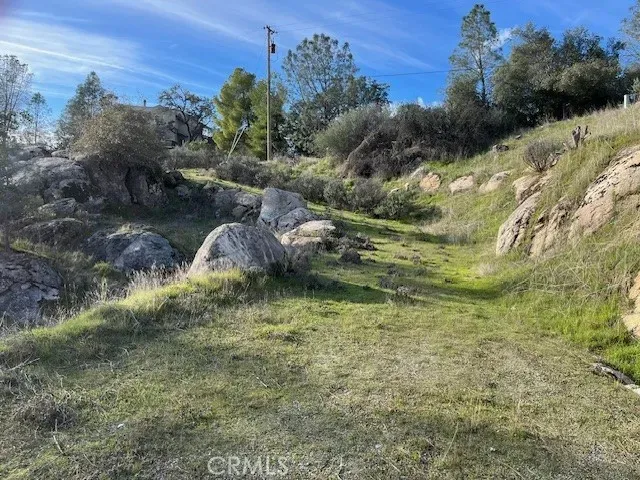 a large body of water with a mountain in the background