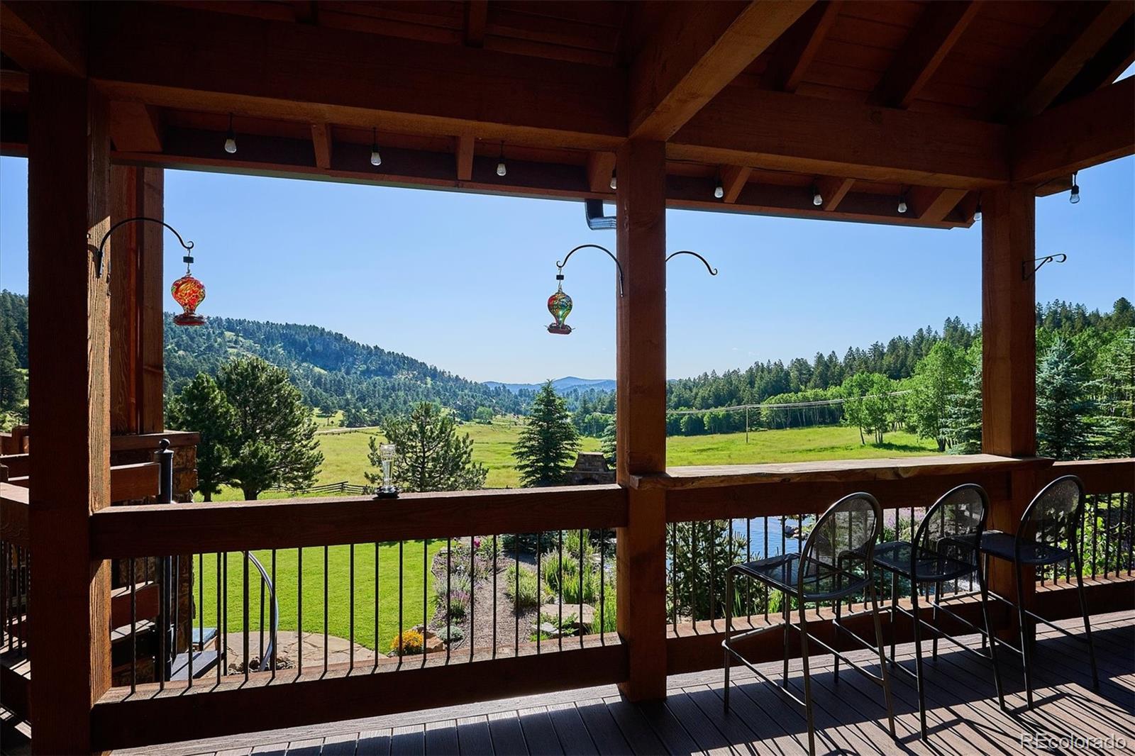477 West Meadow Road Evergreen, CO 80439 - Photo 18 of 50 a view of city from a balcony