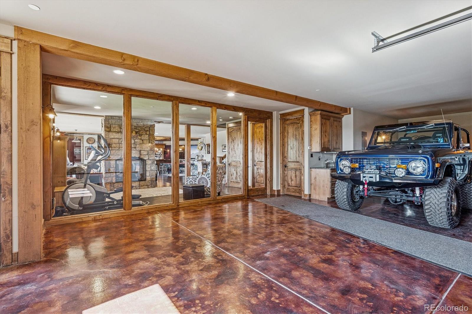 477 West Meadow Road Evergreen, CO 80439 - Photo 36 of 50 a room with lots of table and chairs