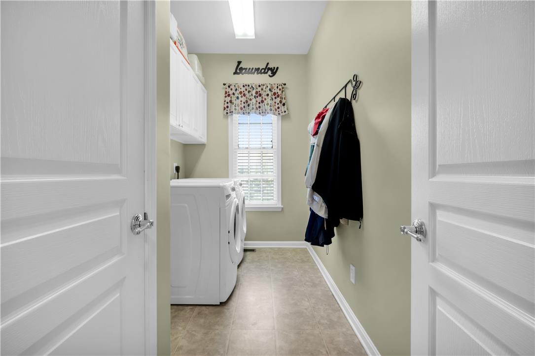 1709 Travers Road Breinigsville, PA 18031 - Photo 24 of 55 Functional utility room with ample natural light.